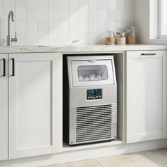 The commercial ice maker is built into a kitchen counter