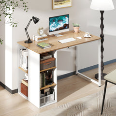 The computer desk in a home office setting with a computer, lamp and books
