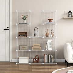 Two white wire cube storage units side by side, styled with books and ornaments