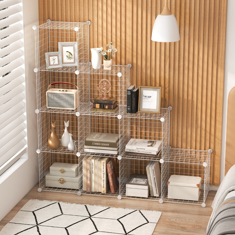 The white wire cube storage unit assembled in different configurations in a bedroom
