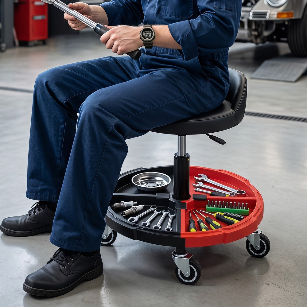 Close up of the red rolling stool with tools and parts organised in the tray