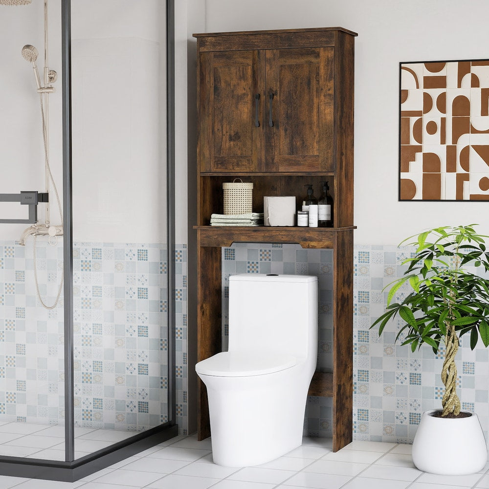 Over the toilet storage unit in a modern bathroom with shower