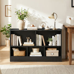 The wooden kids bookcase in a bright room with books and decor