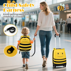 The kids luggage with a safety harness attached to the backpack in an airport