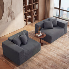 The loveseat split into two separate modular seating sections with a small side table