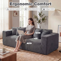 The loveseat with a woman working on a laptop highlighting ergonomic support areas