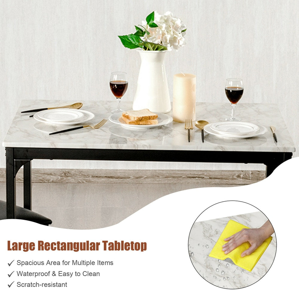 The white dining table has a large rectangular tabletop with a marble effect finish