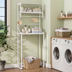 The white bathroom storage unit standing in a laundry room with a basket on the bottom shelf