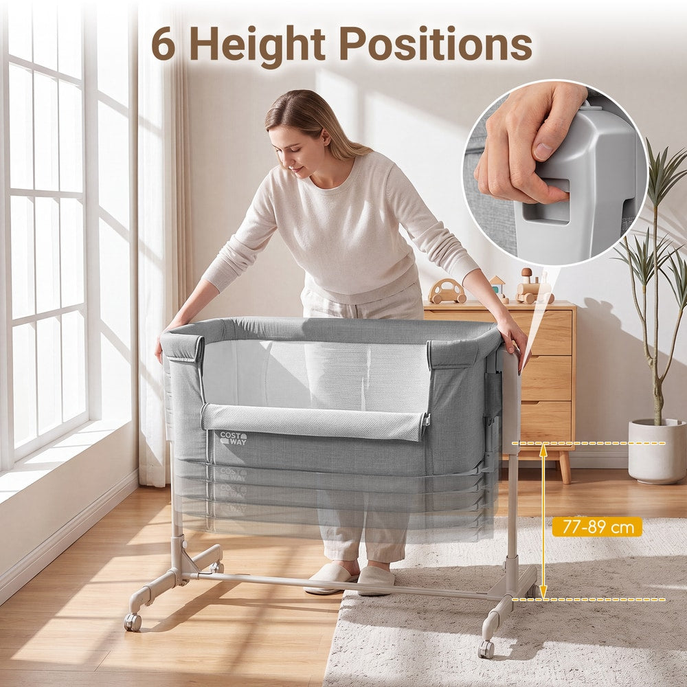 Woman adjusting the height of the grey bedside sleeper