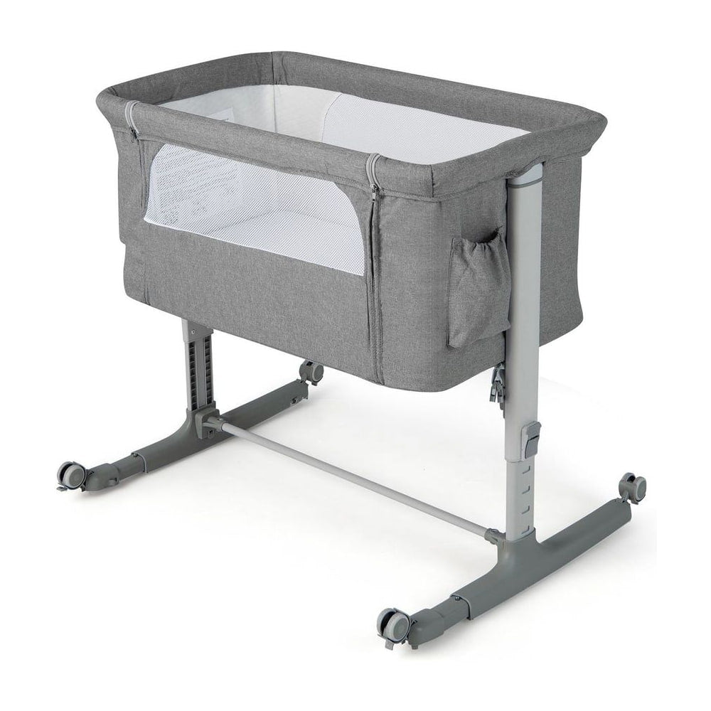 3-in-1 Adjustable Baby Bedside Bassinet with Mattress in light grey, a portable baby bed with wheels and adjustable legs