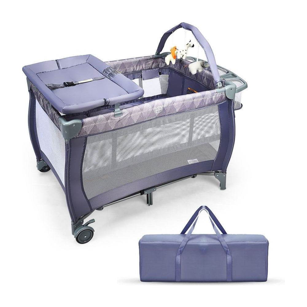 3 in 1 Convertible Bassinet Cot with a changing table and toy bar shown with a storage bag