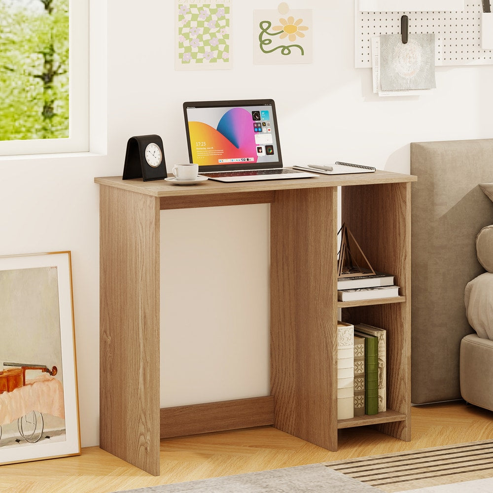 The office desk positioned against a wall next to a bed in a bedroom