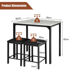 Diagram showing the dimensions of the white dining table and black stools