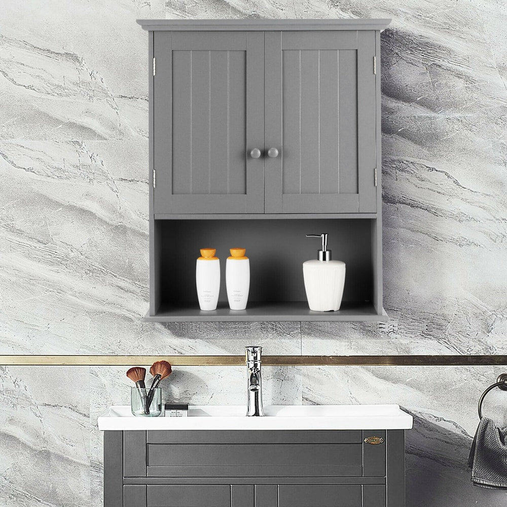 Grey wall cabinet mounted above a sink and vanity unit, with bottles on the shelf