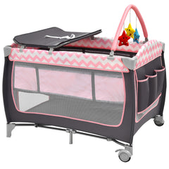 The baby playpen showing the side storage pockets and the toy bar with hanging stars