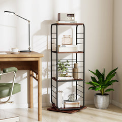 The rustic brown bookcase is shown in a home office setting next to a desk and a plant