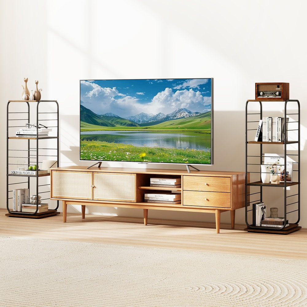 Two rustic brown bookcases are placed either side of a television stand in a living room