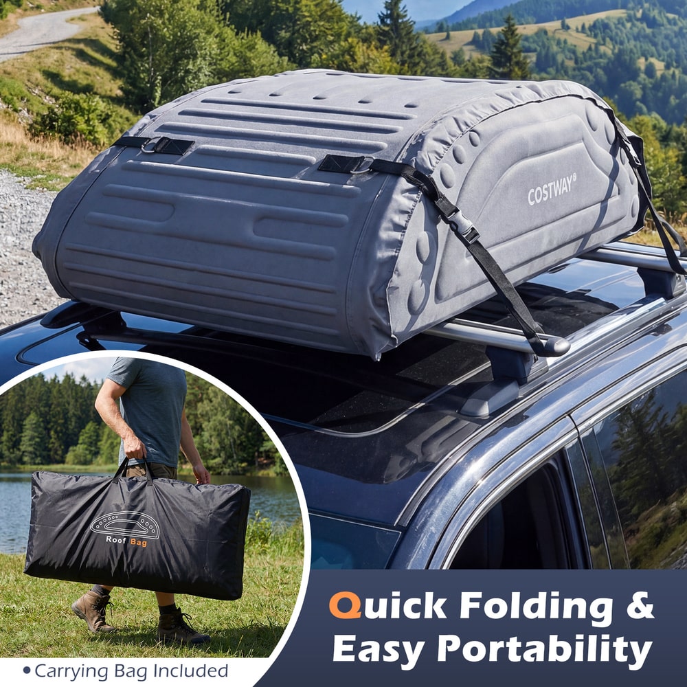 A man holds the grey car roof bag in its carry bag next to a car
