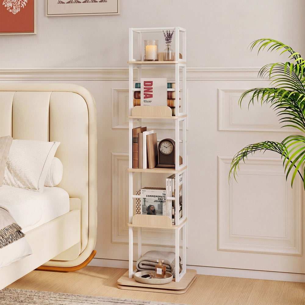 5-Tier Rotating Bookshelf Tower, the oak effect bookcase stands beside a bed in a bedroom setting