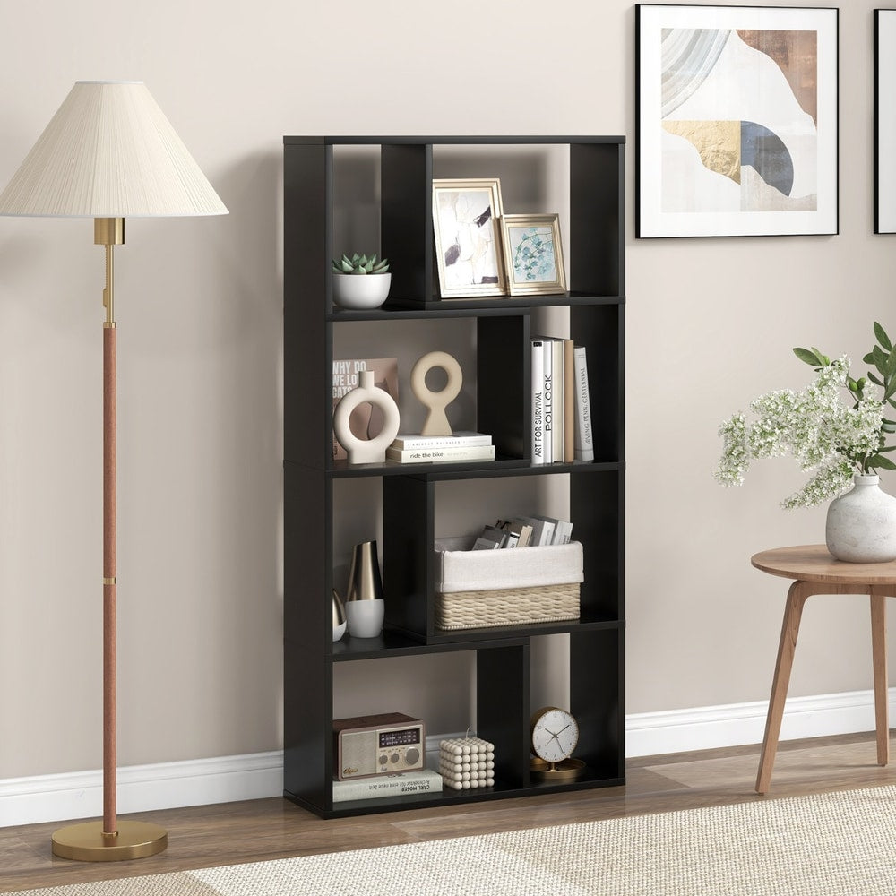 The bookcase standing in a bright living room next to a floor lamp and a small wooden side table