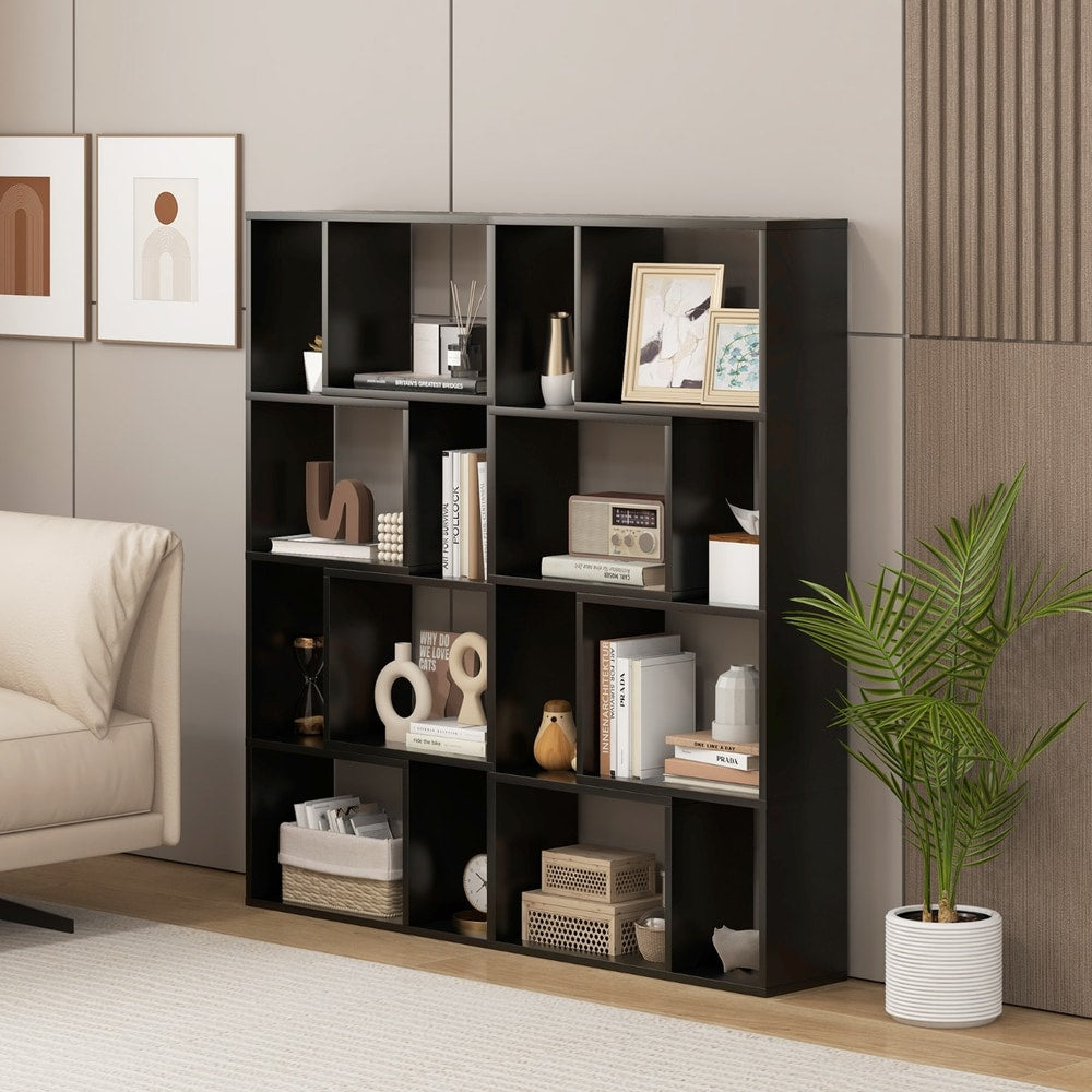 The display unit positioned against a wall in a modern interior with a sofa and a potted plant