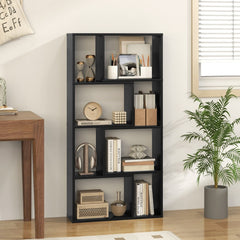 The black open display unit styled with books and office accessories in a home study area