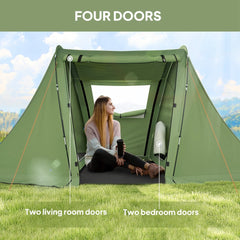 Inside the camping shelter showing two bedroom doors and two living room doors