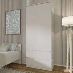 The hinged wardrobe in a bedroom setting next to a bed