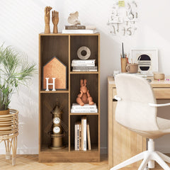 A natural wood effect bookcase styled with ornaments and books in a home office setting