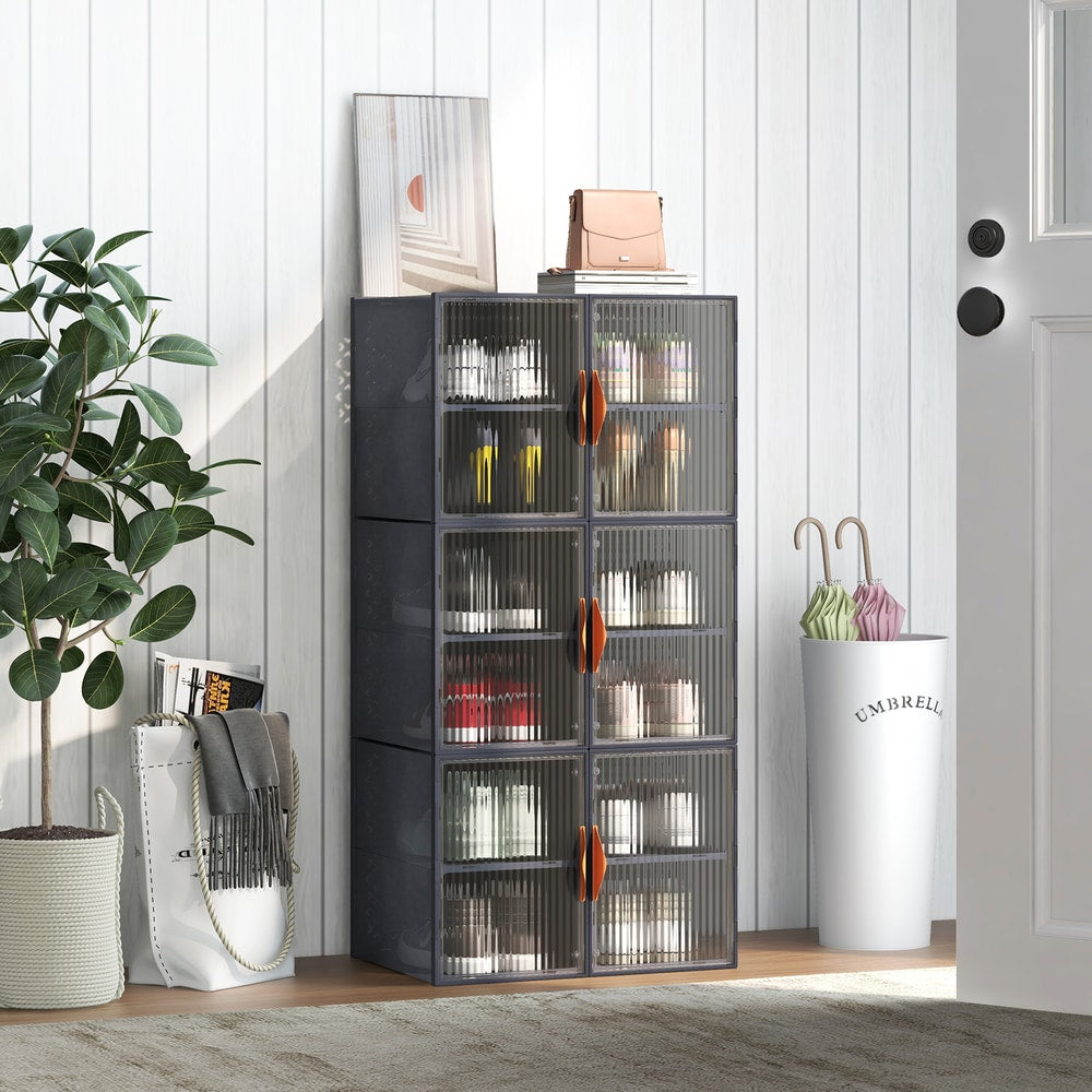 The grey shoe storage units are shown in a hallway with shoes and accessories