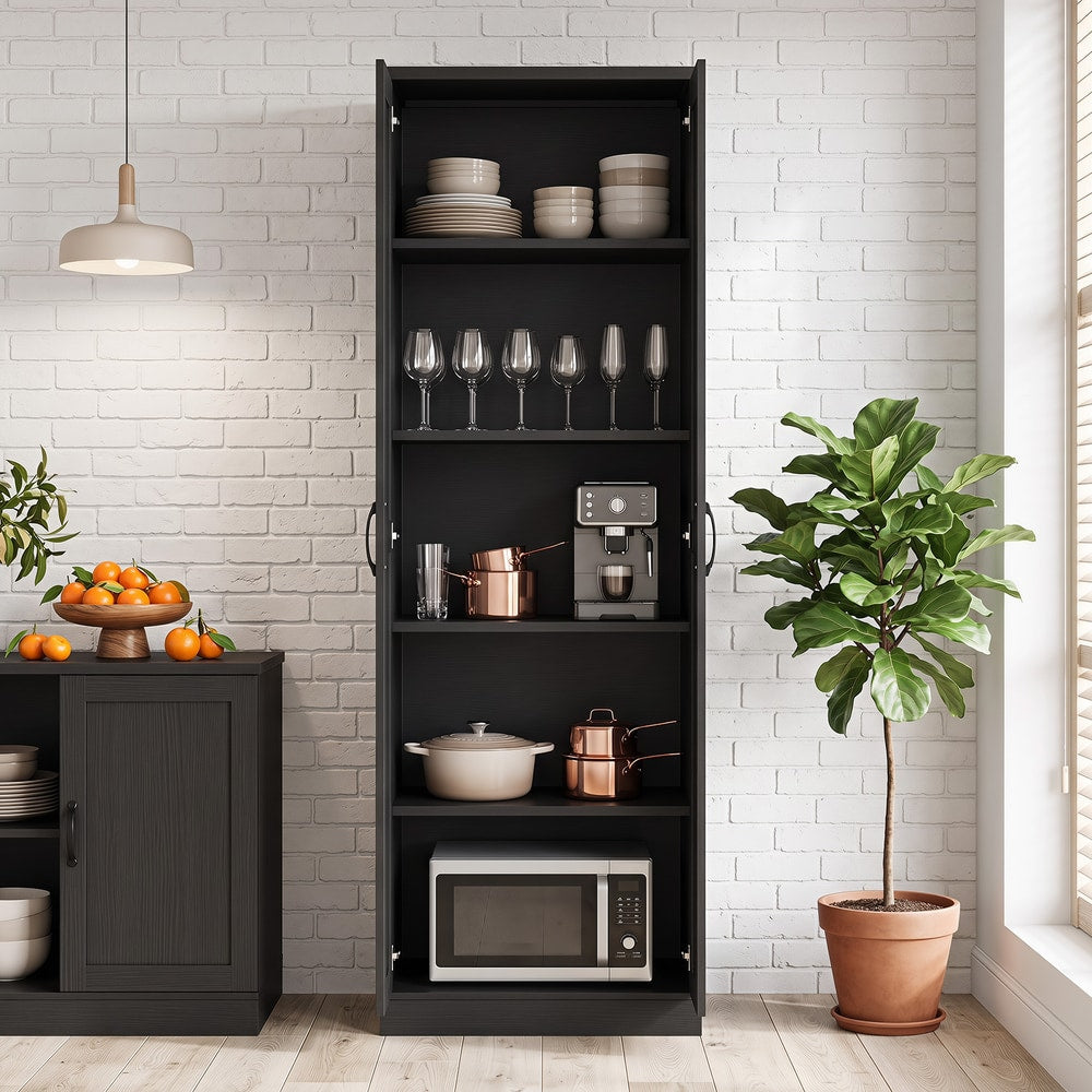 The tall cabinet standing against a white brick wall with shelves holding kitchenware and a microwave