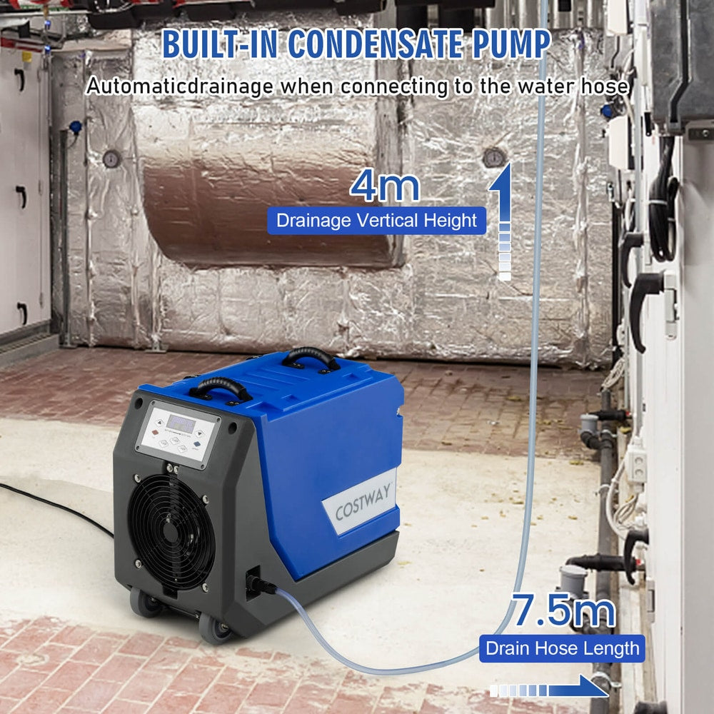 Commercial dehumidifier with a built-in condensate pump and drainage hose attached