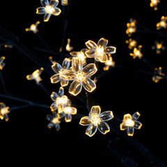 Close-up of the warm white LEDs on the cherry blossom Christmas tree branches