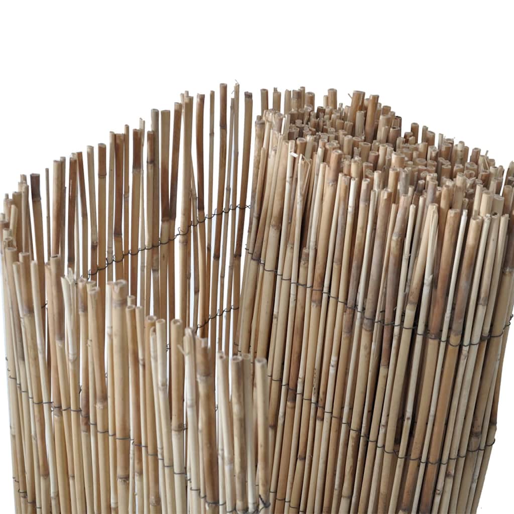 Close-up of the natural bamboo garden fence, showing the individual bamboo canes tied together