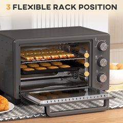 Inside the small oven showing three rack positions for cooking food