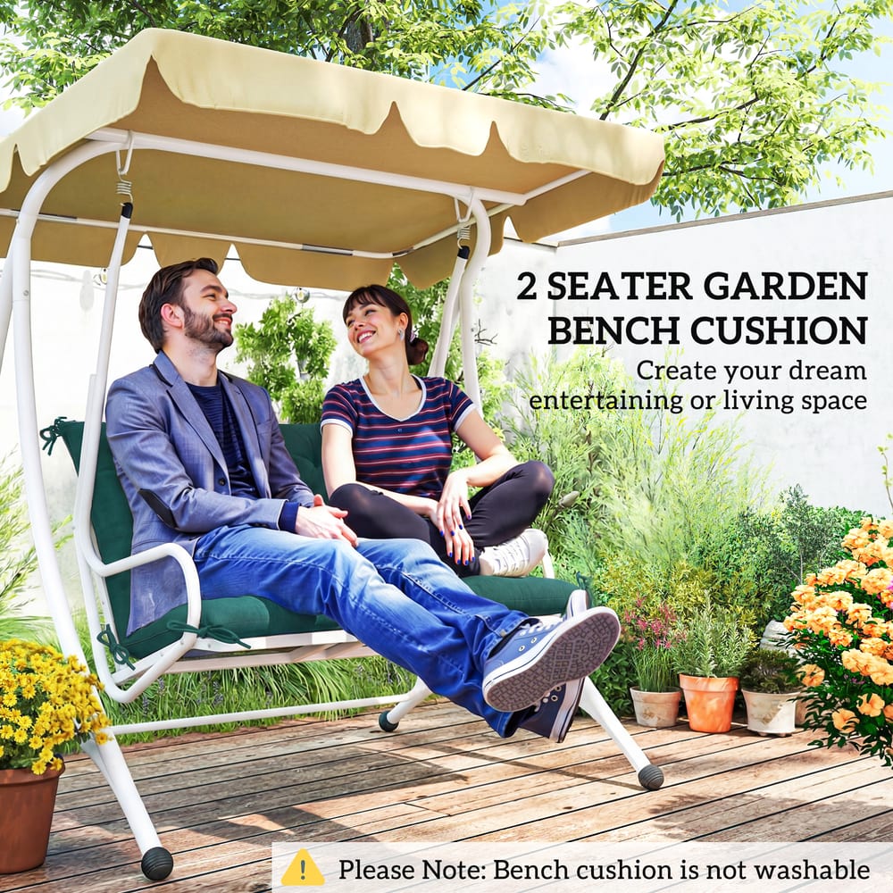 A couple relaxing on a swing seat with the green garden chair cushion