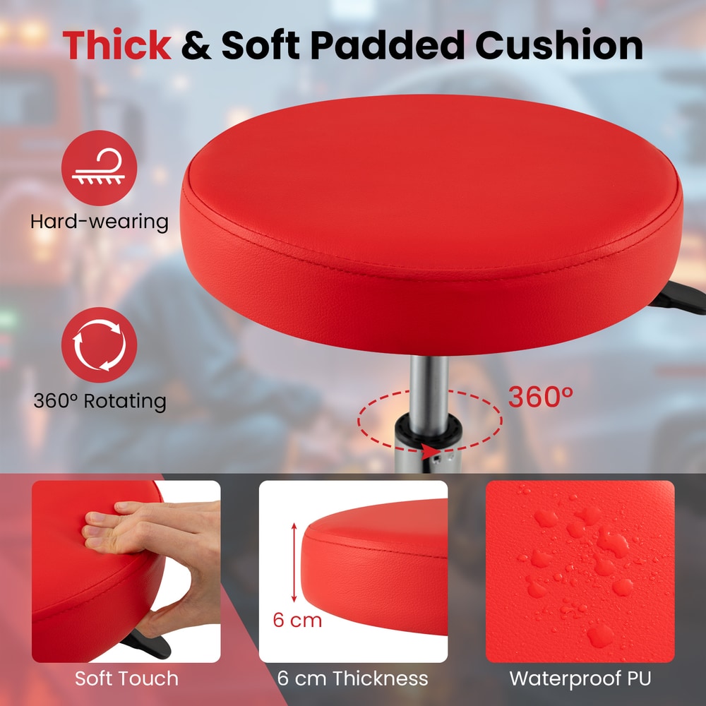 Close up of the red mechanic stool showing the padded seat and storage tray