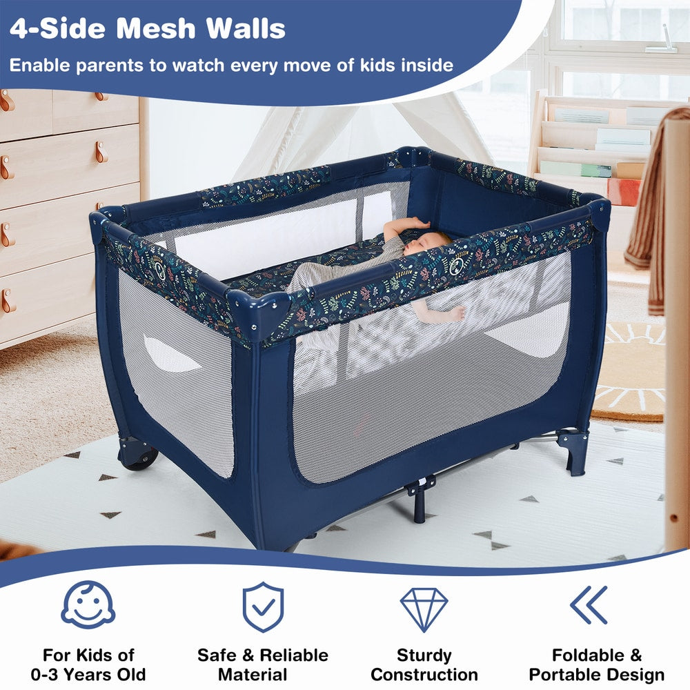Blue baby playpen with mesh walls and lockable wheels in a nursery