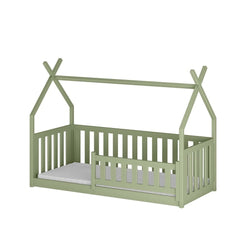 The wooden single house bed Bogus in a light green colour, shown with a mattress inside
