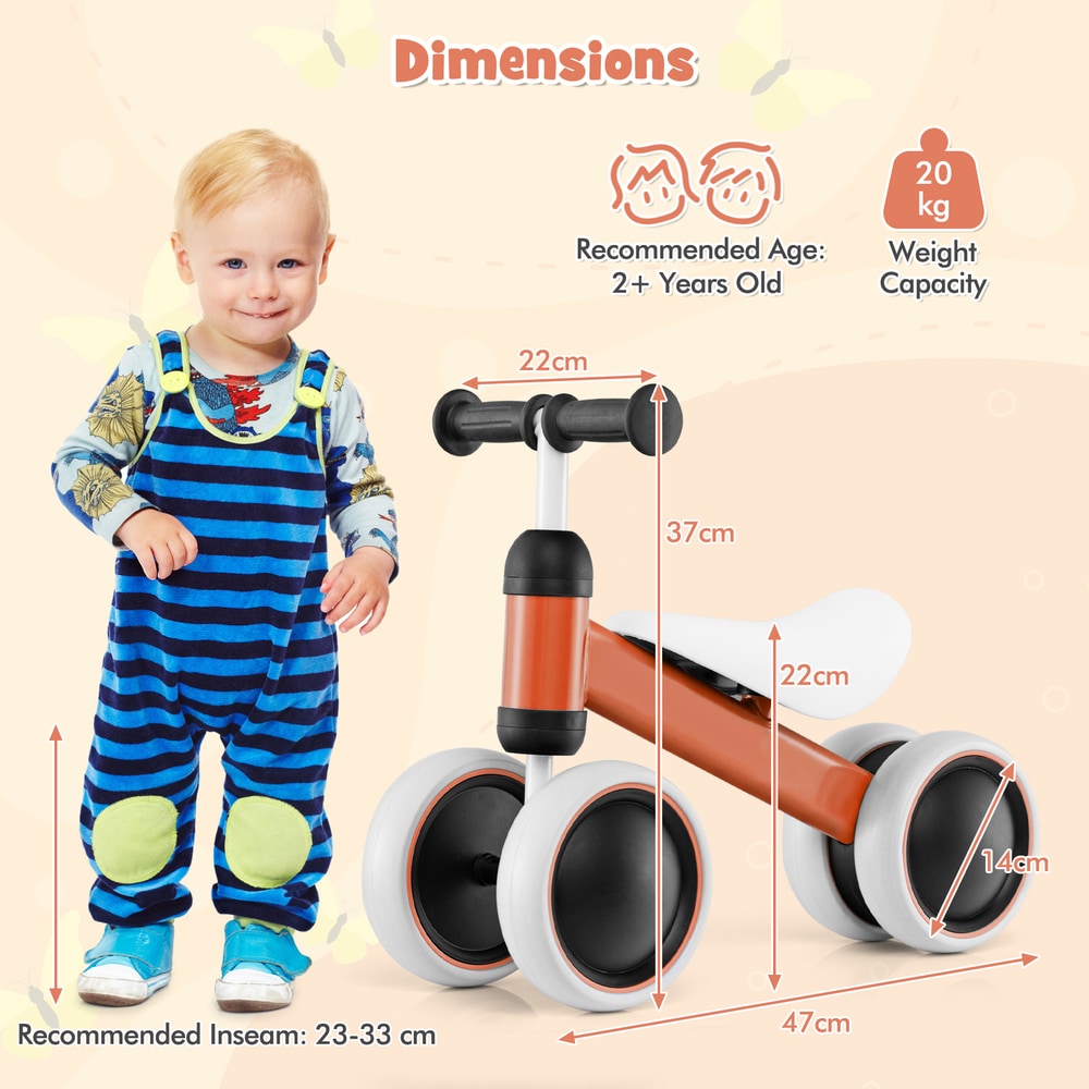 Dimensions diagram showing the orange balance bike with a child for scale