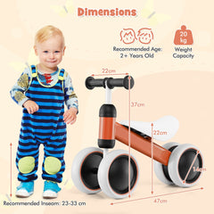 Dimensions diagram showing the orange balance bike with a child for scale