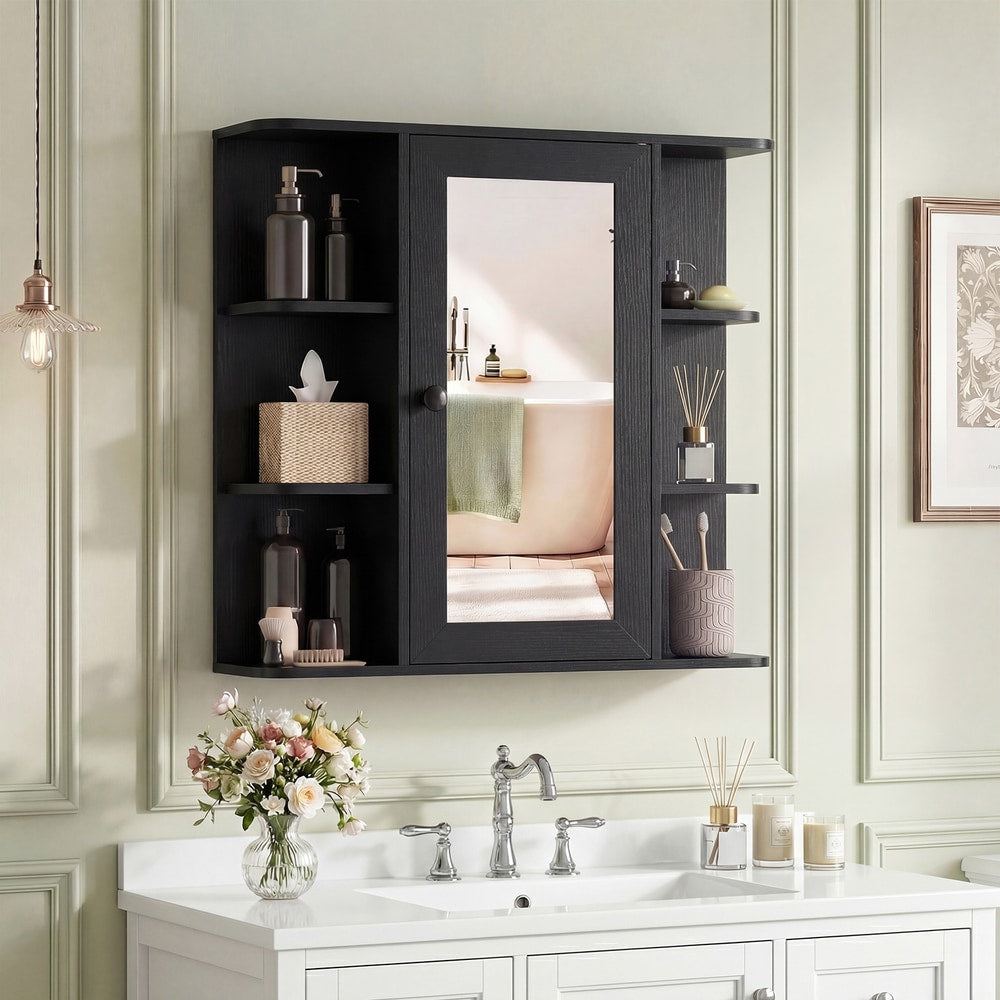 The black wall cabinet with mirror shown above a bathroom sink with toiletries on the shelves