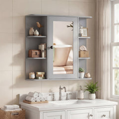 The wall cabinet mounted above a bathroom sink with decorative items on the side shelves