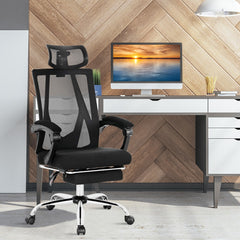 The office chair is shown from the front with the footrest retracted