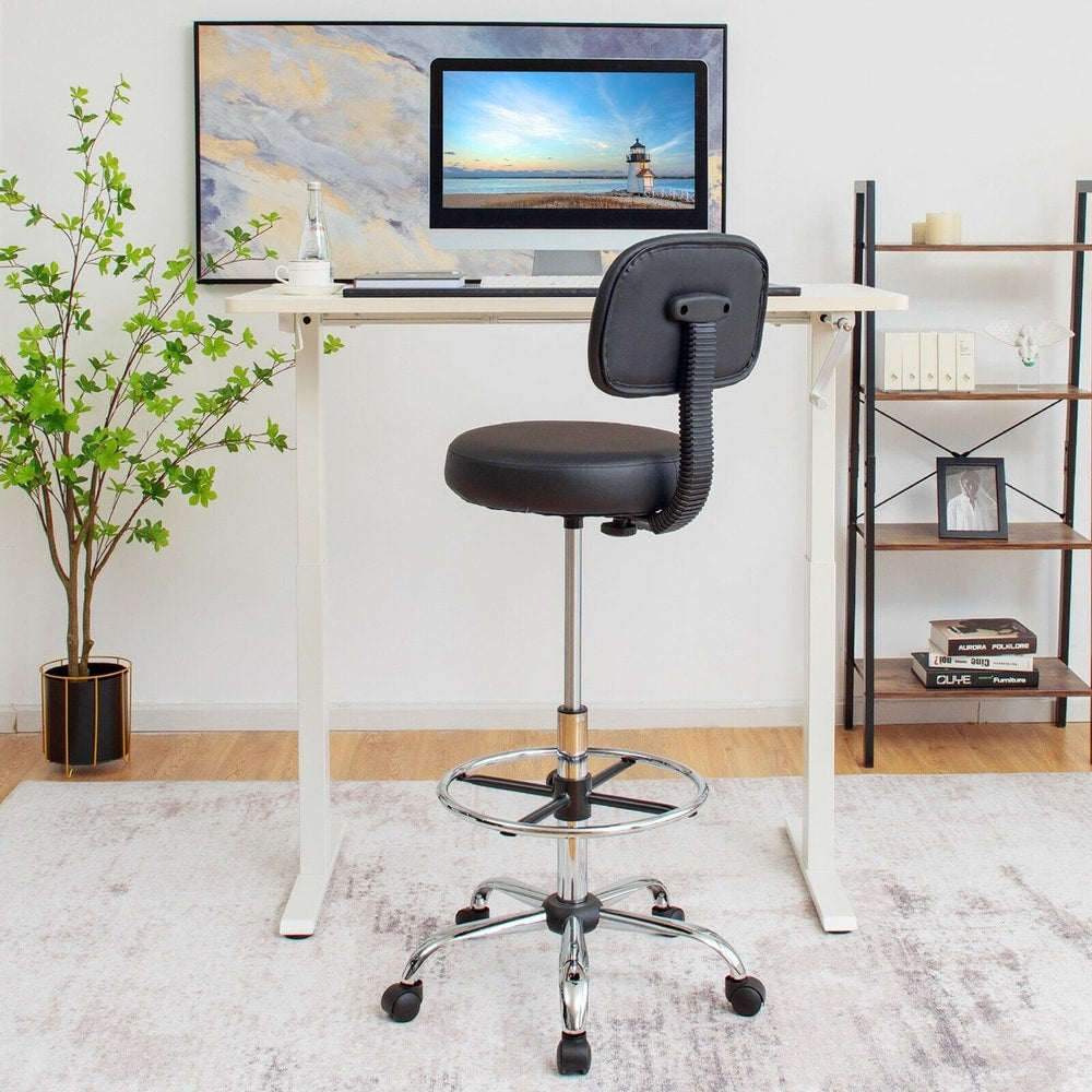 The office chair is shown next to a desk with a computer in a modern room setting