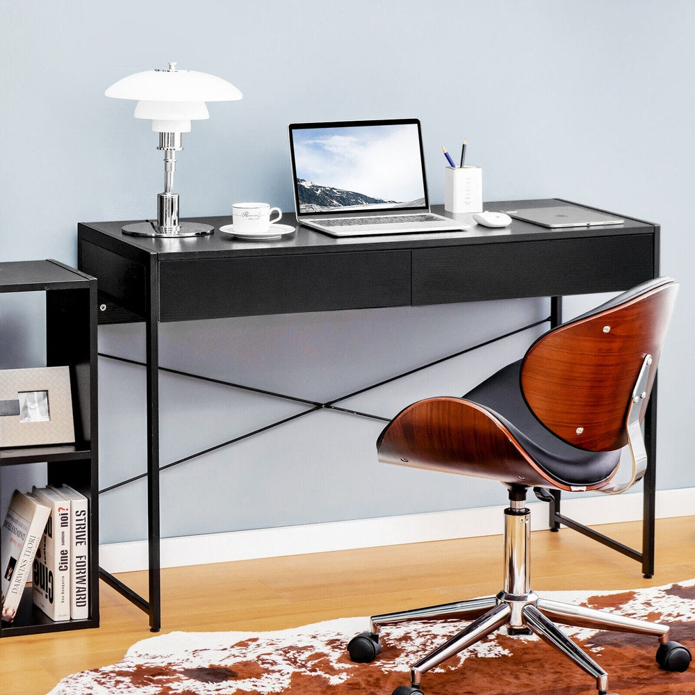 Black wooden study desk with two drawers, shown with a chair and accessories