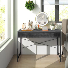 Black wooden study desk with two drawers used as a dressing table