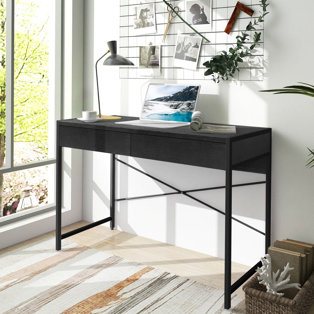 The black wooden study desk with two drawers in a bright room