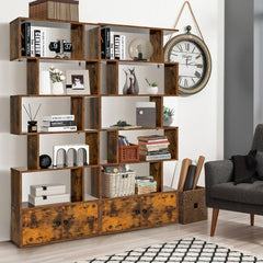 The industrial bookcase with cabinet shown in a living room with a sofa and armchair