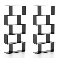 Two black geometric S-shaped bookcases standing side by side in a minimalist room